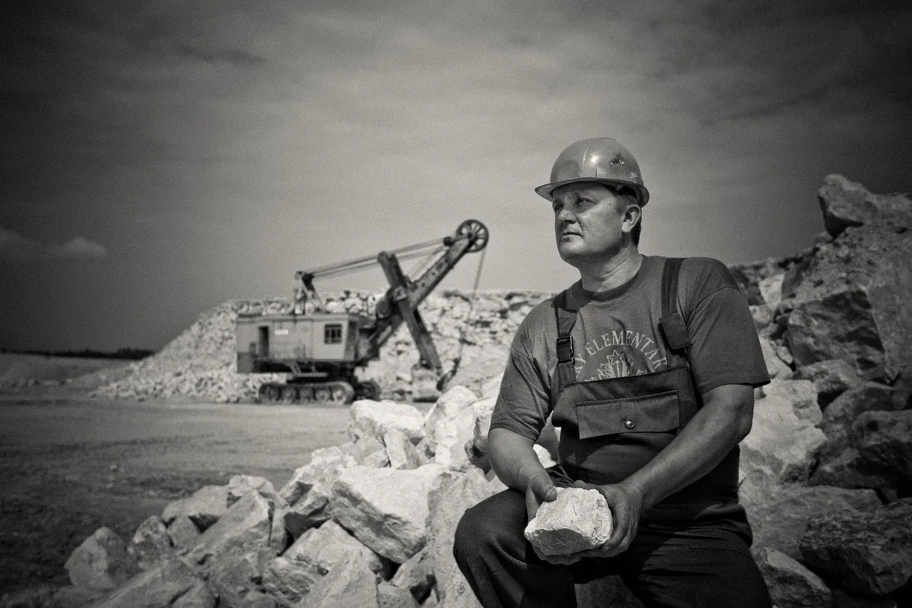 adult, construction, hard hat, man, mine, outdoors, rocks, uniform, vehicle, wear, work, worker, gray work, gray construction, gray rock, construction, hard hat, mine, mine, mine, mine, mine, worker. Equipment hire yards Alberta: OHS and WCB rules