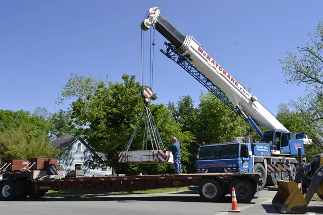 crane, machine, tractor, transportation system, vehicle, equipment, road, industry, action, heavy, street, soil, outdoors, wheel, car, shovel, pavement, bulldozer, traffic, truck, technology, business, sky, power, container, energy, industrial, blue, metal, large, pipeline, construction, environment, production, building, big, mcray crane, houston texas, damage, storm, clean-up, work, lift, worker, hoisted, travel, modern, line, safety, system, auto, electronic, storm damage, demolition, excavation, excavate, lower, lowered, onto, flatbed, jeans, control, hook, steel, concrete, slab, iron, might, strong, strength, hard, tough, powerful, tool, exterior, outside, tree, suburb, home, house, green, white, blue truck, blue tools, blue safety, blue clean, onto, flatbed, flatbed, flatbed, flatbed, flatbed. Equipment rental delivery routes: the 2027 review